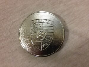 Porsche wapen wieldop
