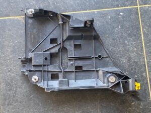 Koplamp montageplaat links